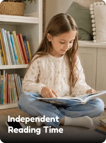 A child reading independently with GigglePal nearby